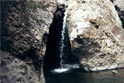 small cave and falls (it goes full circle and the water is deep under falls)